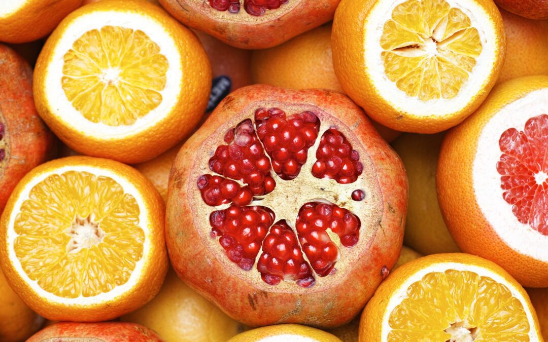 Close up of juice pulp of oranges and grapefruit and pomegranate by Engin Akyur
